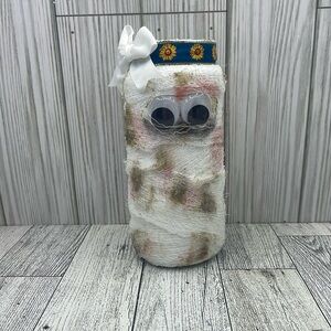 Mummies made from glass jars and gauze.